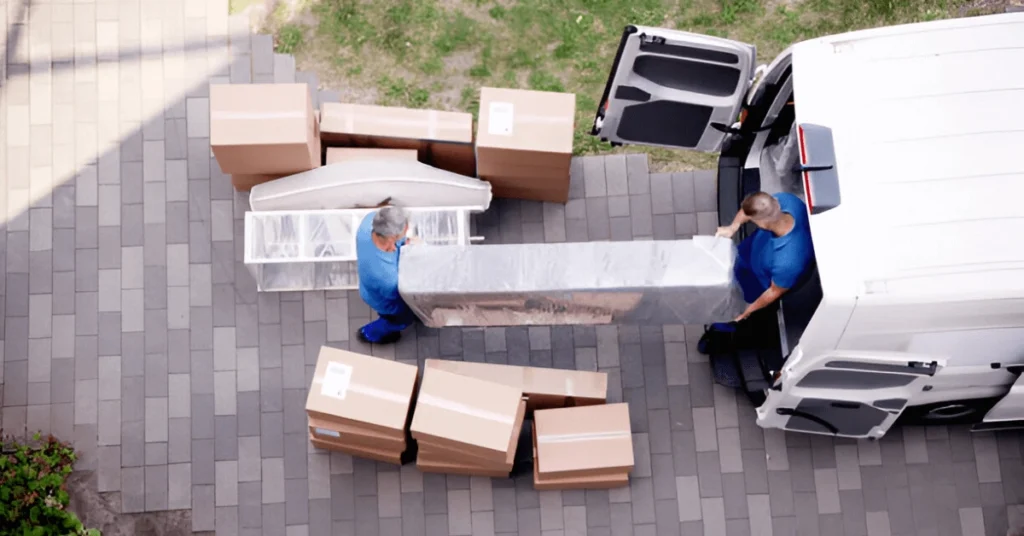 two labours moving cargo