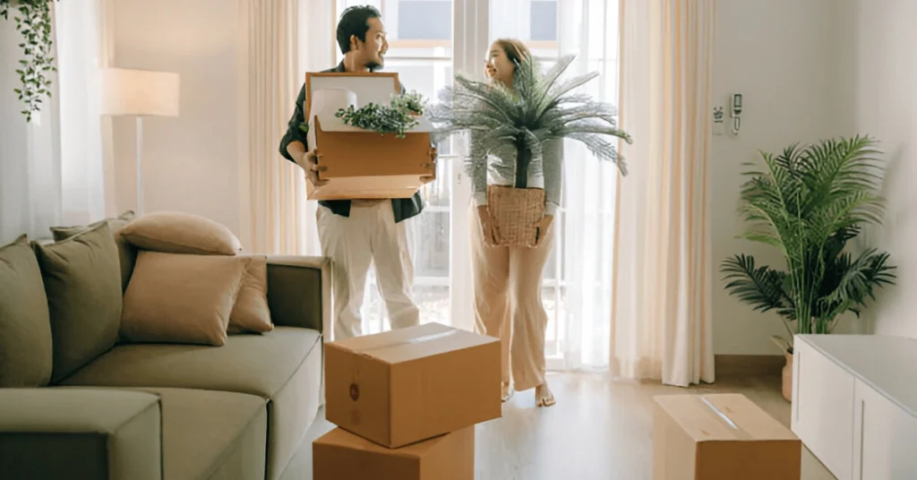 Couple Holding vase and box